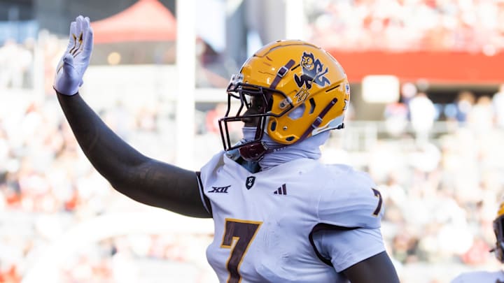 Nov 30, 2024; Tucson, Arizona, USA; Arizona State Sun Devils tight end Chamon Metayer (7) waves to the fans as he celebrates a touchdown against the Arizona Wildcats during the Territorial Cup at Arizona Stadium. Mandatory Credit: Mark J. Rebilas-Imagn Images