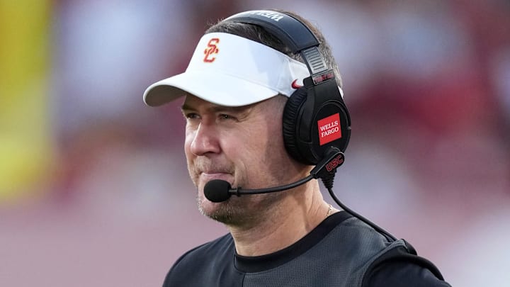 Aug 30, 2025; Los Angeles, California, USA; Southern California Trojans head coach Lincoln Riley watches from the sidelines against the Missouri State Bears in the first half at United Airlines Field at Los Angeles Memorial Coliseum. Mandatory Credit: Kirby Lee-Imagn Images