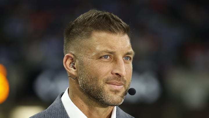 Jan 1, 2026; New Orleans, LA, USA; ESPN broadcaster Tim Tebow looks on prior to the 2026 Sugar Bowl and quarterfinal game of the College Football Playoff between the Georgia Bulldogs and the Mississippi Rebels at Caesars Superdome. Mandatory Credit: Amber Searls-Imagn Images