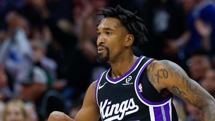 Nov 11, 2025; Sacramento, California, USA; Sacramento Kings guard Malik Monk (0) celebrates after scoring a basket during the first quarter against the Denver Nuggets at Golden 1 Center.