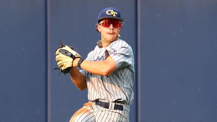 May 31, 2025; Oxford, MS, USA; Georgia Tech Yellowjackets outfielder Drew Burress (8) fields the ball during the first inning against the Murray State Racers. Mandatory Credit: Petre Thomas-Imagn Images
