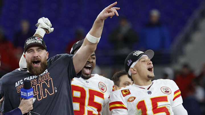Jan 28, 2024; Baltimore, Maryland, USA; Kansas City Chiefs tight end Travis Kelce (M) celebrates with the Lamar Hunt trophy next to Chiefs defensive tackle Chris Jones (95) and Chiefs quarterback Patrick Mahomes (15) while speaking with CBS broadcaster Jim Nantz (L) after the Chiefs' game against the Baltimore Ravens in the AFC Championship football game at M&T Bank Stadium. Mandatory Credit: Geoff Burke-Imagn Images Jan 28, 2024; Baltimore, Maryland, USA; Kansas City Chiefs tight end Travis Kelce (M) celebrates with the Lamar Hunt trophy next to Chiefs defensive tackle Chris Jones (95) and Chiefs quarterback Patrick Mahomes (15) while speaking with CBS broadcaster Jim Nantz (L) after the Chiefs' game against the Baltimore Ravens in the AFC Championship football game at M&T Bank Stadium. Mandatory Credit: Geoff Burke-Imagn Images