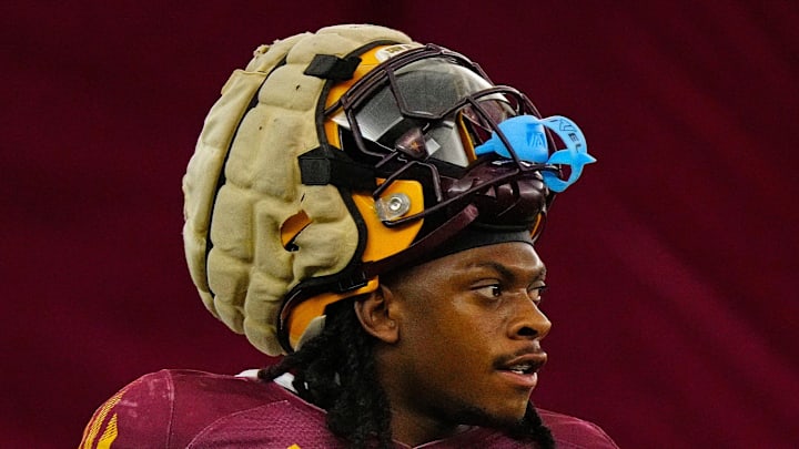 Arizona State running back Kyson Brown (1) watches reps during a practice inside the Verde Dickey Dome in Tempe on Aug. 12, 2025.