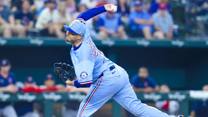 Mar 30, 2025; Arlington, Texas, USA; Texas Rangers relief pitcher Luke Jackson (77) throws during the ninth inning against the Boston Red Sox at Globe Life Field. 