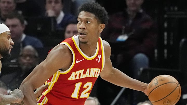 Jan 27, 2025; Minneapolis, Minnesota, USA; Atlanta Hawks forward De'Andre Hunter (12) dribbles against Minnesota Timberwolves forward Nickeil Alexander-Walker (9) in the fourth quarter at Target Center. Mandatory Credit: Bruce Kluckhohn-Imagn Images Jan 27, 2025; Minneapolis, Minnesota, USA; Atlanta Hawks forward De'Andre Hunter (12) dribbles against Minnesota Timberwolves forward Nickeil Alexander-Walker (9) in the fourth quarter at Target Center. Mandatory Credit: Bruce Kluckhohn-Imagn Images