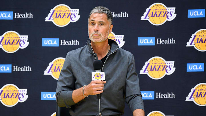 Sep 25, 2025; El Segundo, CA, USA; Los Angeles Lakers general manager Rob Pelinka, left, speaks during a press conference to preview the 2025-26 season at UCLA Health Training Center. Mandatory Credit: William Liang-Imagn Images
