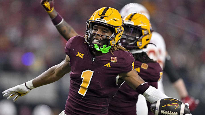 Dec 7, 2024; Arlington, TX, USA; Arizona State Sun Devils defensive back Keith Abney II (1) and defensive back Shamari Simmons (7) celebrate during the game between the Iowa State Cyclones and the Arizona State Sun Devils at AT&T Stadium. Mandatory Credit: Jerome Miron-Imagn Images