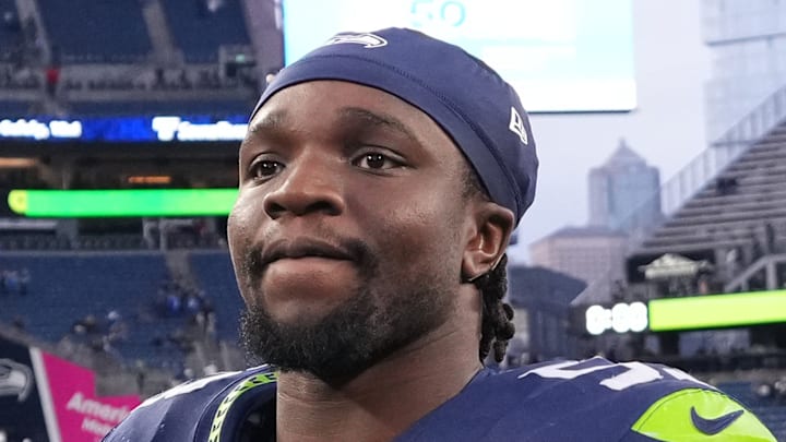 Boye Mafe of the Seattle Seahawks walks off the field Boye Mafe of the Seattle Seahawks walks off the field