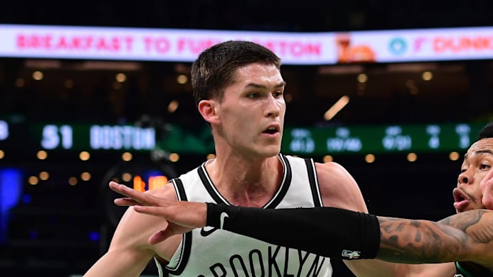 Nov 21, 2025; Boston, Massachusetts, USA; Brooklyn Nets guard Egor Demin (8) controls the ball from Boston Celtics guard Anfernee Simons (4) during the first half at TD Garden. Mandatory Credit: Bob DeChiara-Imagn Images