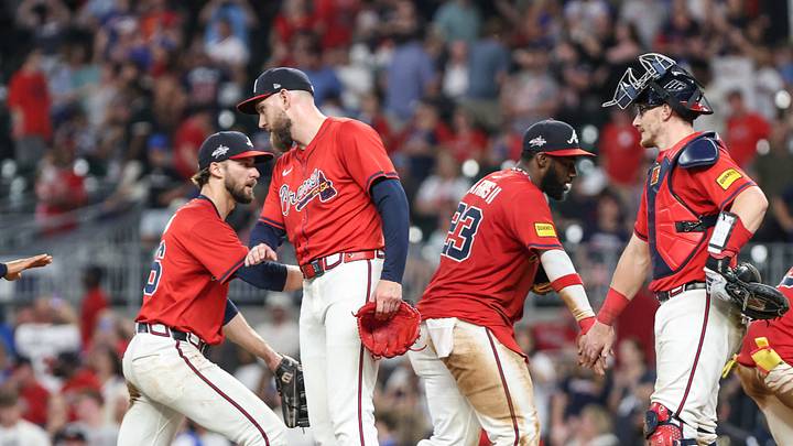 Jun 13, 2025; Cumberland, Georgia, USA; Atlanta Braves second base Ozzie Albies (1), outfielder Eli White (36), pitcher Dylan Lee (52), outfielder Michael Harris II (23), catcher Sean Murphy (12), outfielder Ronald Acuna Jr. (13) shake hands after a victory against the Colorado Rockies during the ninth inning at Truist Park. Mandatory Credit: Jordan Godfree-Imagn Images Jun 13, 2025; Cumberland, Georgia, USA; Atlanta Braves second base Ozzie Albies (1), outfielder Eli White (36), pitcher Dylan Lee (52), outfielder Michael Harris II (23), catcher Sean Murphy (12), outfielder Ronald Acuna Jr. (13) shake hands after a victory against the Colorado Rockies during the ninth inning at Truist Park. Mandatory Credit: Jordan Godfree-Imagn Images
