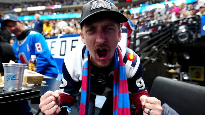 May 22, 2026; Denver, Colorado, USA; A Colorado Avalanche fan cheers during the first period against the Vegas Golden Knights in game two of the Western Conference Final of the 2026 Stanley Cup Playoffs at Ball Arena. Mandatory Credit: Ron Chenoy-Imagn Images May 22, 2026; Denver, Colorado, USA; A Colorado Avalanche fan cheers during the first period against the Vegas Golden Knights in game two of the Western Conference Final of the 2026 Stanley Cup Playoffs at Ball Arena. Mandatory Credit: Ron Chenoy-Imagn Images