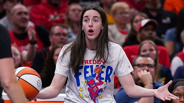 Indiana Fever guard Caitlin Clark (22) reacts to a call from the referee Tuesday, Aug. 12, 2025, during the game at Gainbridge Fieldhouse in Indianapolis. The Dallas Wings defeated the Indiana Fever, 81-80. Indiana Fever guard Caitlin Clark (22) reacts to a call from the referee Tuesday, Aug. 12, 2025, during the game at Gainbridge Fieldhouse in Indianapolis. The Dallas Wings defeated the Indiana Fever, 81-80.