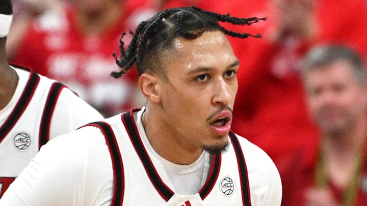 Feb 17, 2026; Raleigh, North Carolina, USA;  NC State Wolfpack forward Darrion Williams (1) looks on after scoring against the North Carolina Tar Heels during the second half at Lenovo Center. Mandatory Credit: Zachary Taft-Imagn Images