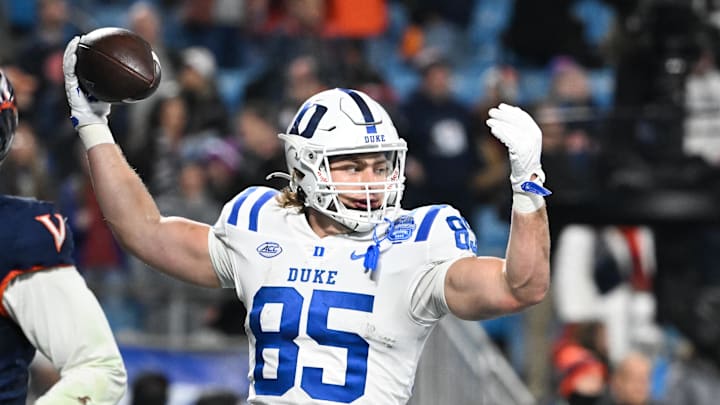 Duke tight end Jeremiah Hasley celebrates a touchdown in the ACC championship game. The Blue Devils will wait to see if their title game win is enough to make the College Football Playoff.