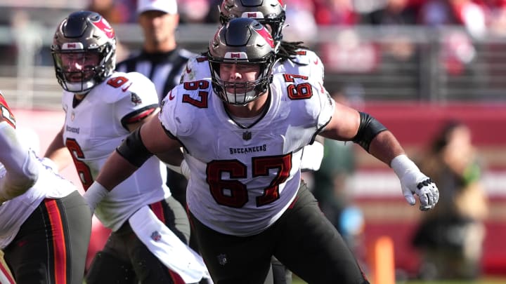 Nov 19, 2023; Santa Clara, California, USA; Tampa Bay Buccaneers offensive tackle Luke Goedeke (67) blocks against San Francisco 49ers linebacker Fred Warner (54) during the second quarter at Levi's Stadium. Mandatory Credit: Darren Yamashita-USA TODAY Sports