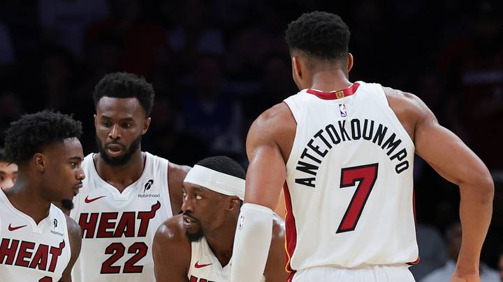 Oct 26, 2026; Miami, Florida, USA; Miami Heat guard Davion Mitchell (2) speaks to guard Klay Thompson (11), forward Andrew Wiggins (22), center Bam Adebayo (13) and forward Giannis Antetokounmpo (7) during the third quarter against the Dallas Mavericks at Kaseya Center. Mandatory Credit: Sam Navarro-Imagn Images Oct 26, 2026; Miami, Florida, USA; Miami Heat guard Davion Mitchell (2) speaks to guard Klay Thompson (11), forward Andrew Wiggins (22), center Bam Adebayo (13) and forward Giannis Antetokounmpo (7) during the third quarter against the Dallas Mavericks at Kaseya Center. Mandatory Credit: Sam Navarro-Imagn Images
