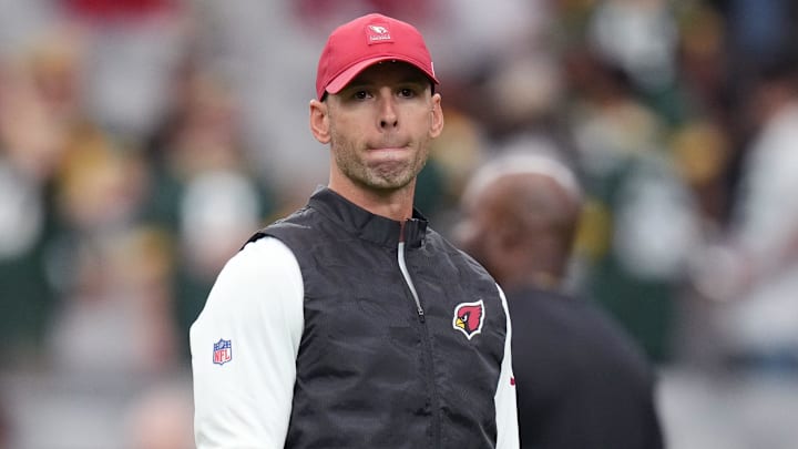 Arizona Cardinals head coach Jonathan Gannon watches as his team warms up before playing against the Green Bay Packers at State Farm Stadium in Glendale on Oct. 19, 2025.