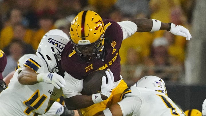 Arizona State running back Kyson Brown (1) runs for a first down against NAU during a game at Mountain America Stadium in Tempe on Aug. 30, 2025.