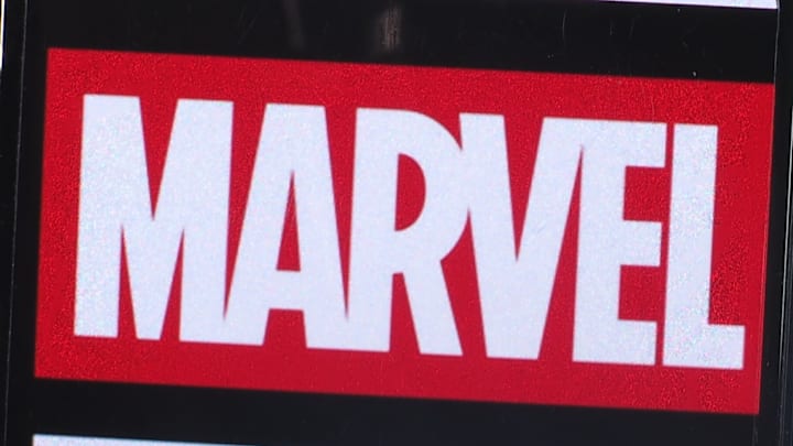 In this photo illustration, Marvel Entertainment logo seen...
