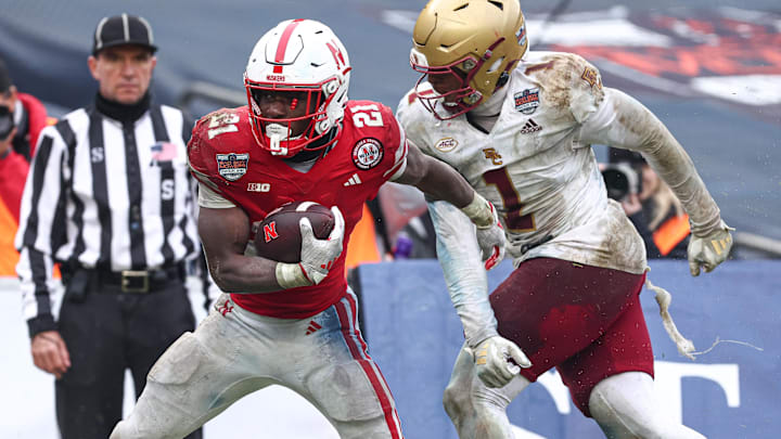 Nebraska running back Emmett Johnson scores a touchdown against Boston College in Pinstripe Bowl. Will the Huskers have momentum from last season's bowl victory? Nebraska running back Emmett Johnson scores a touchdown against Boston College in Pinstripe Bowl. Will the Huskers have momentum from last season's bowl victory?