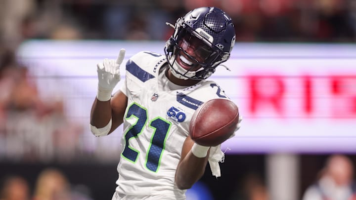 Dec 7, 2025; Atlanta, Georgia, USA; Seattle Seahawks cornerback Devon Witherspoon (21) celebrates after a fumble recovery against the Atlanta Falcons in the third quarter at Mercedes-Benz Stadium.