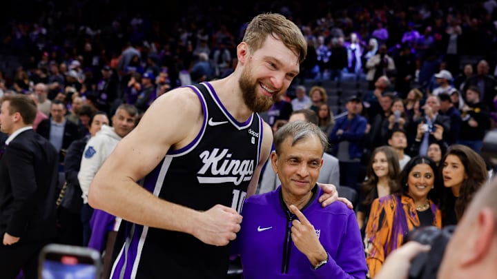 Mar 25, 2024; Sacramento, California, USA; Sacramento Kings forward Domantas Sabonis (10) poses for a photo with Kings owner Vivek Ranadive after a game against the Philadelphia 76ers at Golden 1 Center. Mandatory Credit: Sergio Estrada-Imagn Images