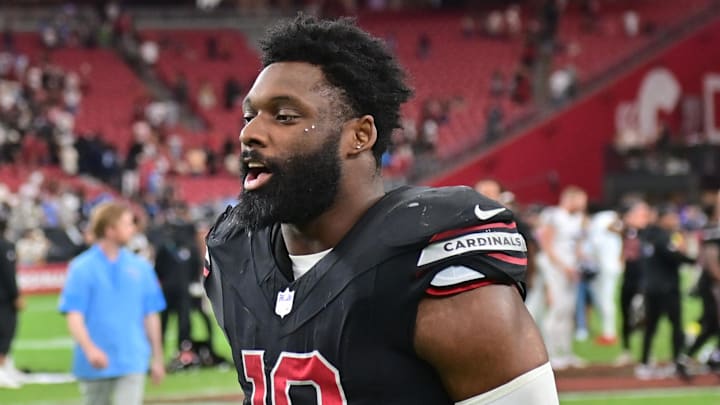 Oct 5, 2025; Glendale, Arizona, USA; Arizona Cardinals outside linebacker Josh Sweat (10) walks off the field at the end of their game against the Tennessee Titans at State Farm Stadium. Mandatory Credit: Matt Kartozian-Imagn Images