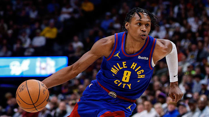 Feb 1, 2026; Denver, Colorado, USA; Denver Nuggets guard Peyton Watson (8) controls the ball in the third quarter against the Oklahoma City Thunder at Ball Arena. Mandatory Credit: Isaiah J. Downing-Imagn Images