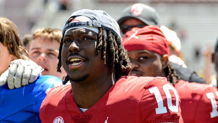 Oklahoma linebacker Kip Lewis lines up with his teammates after the spring game. Oklahoma linebacker Kip Lewis lines up with his teammates after the spring game.