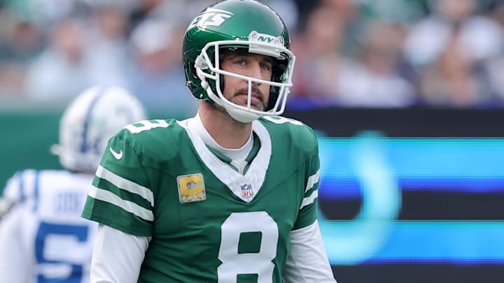 Nov 17, 2024; East Rutherford, New Jersey, USA; New York Jets quarterback Aaron Rodgers (8) reacts during the first quarter against the Indianapolis Colts at MetLife Stadium. Mandatory Credit: Brad Penner-Imagn Images