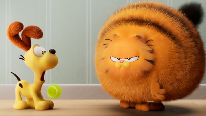 Odie and Garfield (voiced by Chris Pratt) in THE GARFIELD MOVIE. © 2023 Project G Productions, LLC