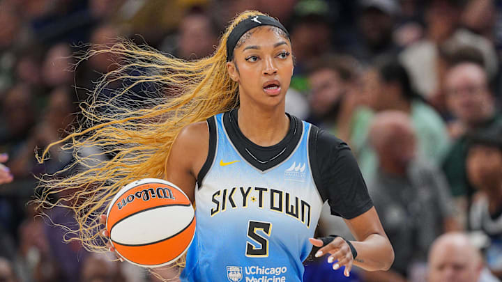 Jul 22, 2025; Minneapolis, Minnesota, USA; Chicago Sky forward Angel Reese (5) dribbles against the Minnesota Lynx in the first quarter at Target Center. Mandatory Credit: Brad Rempel-Imagn Images