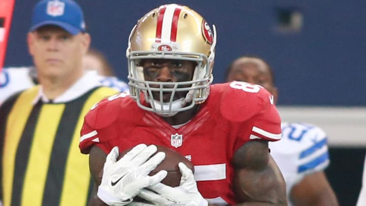 Sep 7, 2014; Arlington, TX, USA; San Francisco 49ers tight end Vernon Davis (85) catches a pass against the Dallas Cowboys at AT&T Stadium. San Francisco beat Dallas 28-17. Mandatory Credit: Tim Heitman-Imagn Images