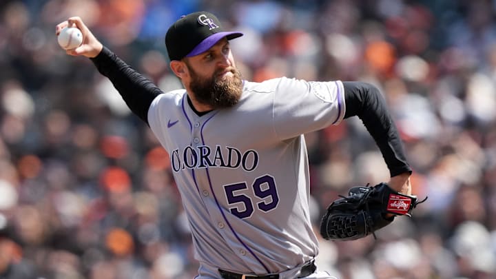 Colorado Rockies relief pitcher Jake Bird (59) throws a pitch