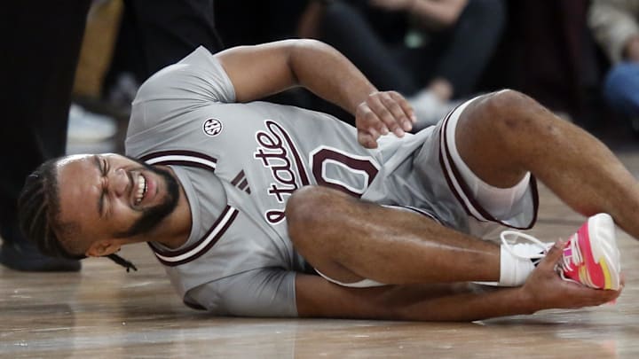 Mississippi State Bulldogs guard Jayden Epps (10) reacts as he grabs his ankle during the second half against the Alabama Crimson Tide at Humphrey Coliseum in Starkville, Miss. Mississippi State Bulldogs guard Jayden Epps (10) reacts as he grabs his ankle during the second half against the Alabama Crimson Tide at Humphrey Coliseum in Starkville, Miss.