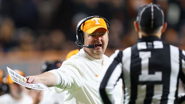Nov 1, 2025; Knoxville, Tennessee, USA; Tennessee Volunteers head coach Josh Heupel speaks with an official during the second half against the Oklahoma Sooners at Neyland Stadium. Mandatory Credit: Randy Sartin-Imagn Images