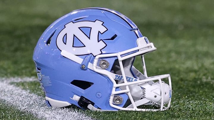 Oct 28, 2023; Atlanta, Georgia, USA; A detailed view of a North Carolina Tar Heels helmet on the field before a game against the Georgia Tech Yellow Jackets at Bobby Dodd Stadium at Hyundai Field. Mandatory Credit: Brett Davis-Imagn Images Oct 28, 2023; Atlanta, Georgia, USA; A detailed view of a North Carolina Tar Heels helmet on the field before a game against the Georgia Tech Yellow Jackets at Bobby Dodd Stadium at Hyundai Field. Mandatory Credit: Brett Davis-Imagn Images
