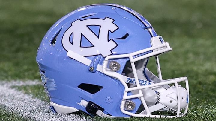 Oct 28, 2023; Atlanta, Georgia, USA; A detailed view of a North Carolina Tar Heels helmet on the field before a game against the Georgia Tech Yellow Jackets at Bobby Dodd Stadium at Hyundai Field. Mandatory Credit: Brett Davis-Imagn Images Oct 28, 2023; Atlanta, Georgia, USA; A detailed view of a North Carolina Tar Heels helmet on the field before a game against the Georgia Tech Yellow Jackets at Bobby Dodd Stadium at Hyundai Field. Mandatory Credit: Brett Davis-Imagn Images