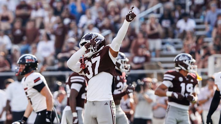 Mississippi State linebacker Nevaeh Sanders celebrates after a blocked punt in Saturday's game against Northern Illinois. Mississippi State linebacker Nevaeh Sanders celebrates after a blocked punt in Saturday's game against Northern Illinois.