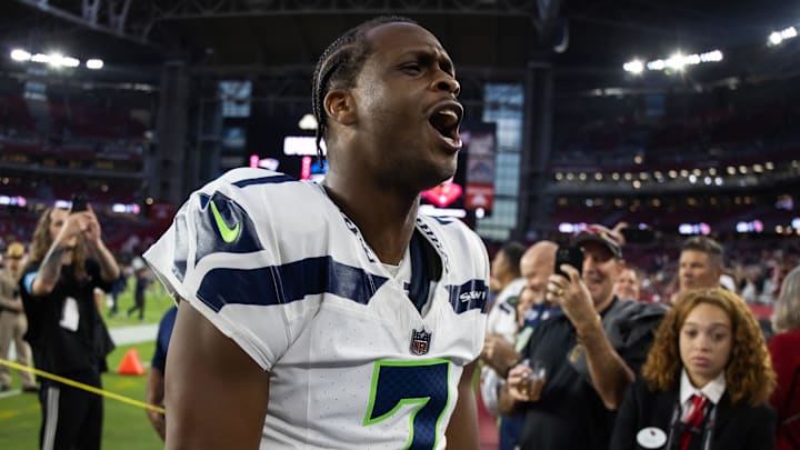 Dec 8, 2024; Glendale, Arizona, USA; Seattle Seahawks quarterback Geno Smith (7) celebrates after defeating the Arizona Cardinals at State Farm Stadium.