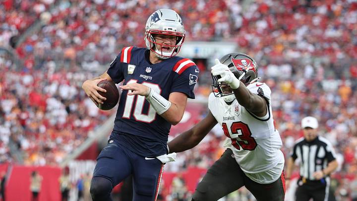 Nov 9, 2025; Tampa, Florida, USA; New England Patriots quarterback Drake Maye (10) runs for a gain past Tampa Bay Buccaneers safety Tykee Smith (23) during the fourth quarter at Raymond James Stadium. Mandatory Credit: Nathan Ray Seebeck-Imagn Images Nov 9, 2025; Tampa, Florida, USA; New England Patriots quarterback Drake Maye (10) runs for a gain past Tampa Bay Buccaneers safety Tykee Smith (23) during the fourth quarter at Raymond James Stadium. Mandatory Credit: Nathan Ray Seebeck-Imagn Images