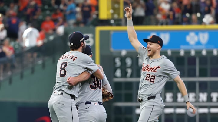 Oct 2, 2024; Houston, Texas, USA; Detroit Tigers outfielder Matt Vierling (8) and outfielder Kerry Carpenter (30) celebrate with outfielder Parker Meadows (22) after defeating the Houston Astros in game two of the Wildcard round for the 2024 MLB Playoffs at Minute Maid Park.