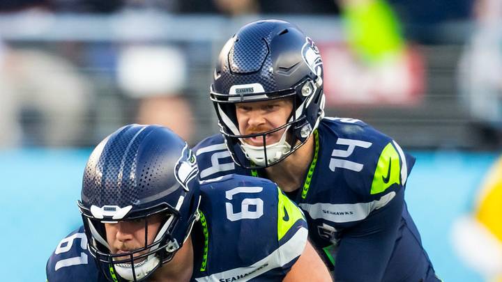 Seattle Seahawks center Jalen Sundell (61) and quarterback Sam Darnold (14)