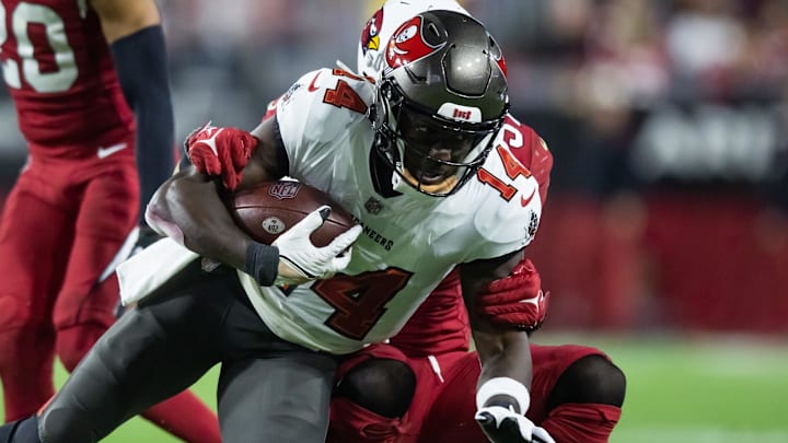 Dec 25, 2022; Glendale, Arizona, USA; Tampa Bay Buccaneers wide receiver Chris Godwin (14) against the Arizona Cardinals at State Farm Stadium. Mandatory Credit: Mark J. Rebilas-Imagn Images Dec 25, 2022; Glendale, Arizona, USA; Tampa Bay Buccaneers wide receiver Chris Godwin (14) against the Arizona Cardinals at State Farm Stadium. Mandatory Credit: Mark J. Rebilas-Imagn Images
