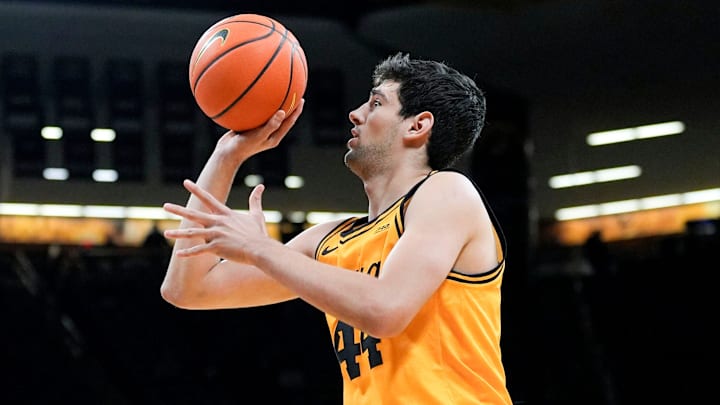Iowa forward Joey Matteoni (44) shoots the basketball against the Maryland Terrapins Dec. 6, 2025 at Carver-Hawkeye Arena in Iowa City, Iowa. Iowa forward Joey Matteoni (44) shoots the basketball against the Maryland Terrapins Dec. 6, 2025 at Carver-Hawkeye Arena in Iowa City, Iowa.