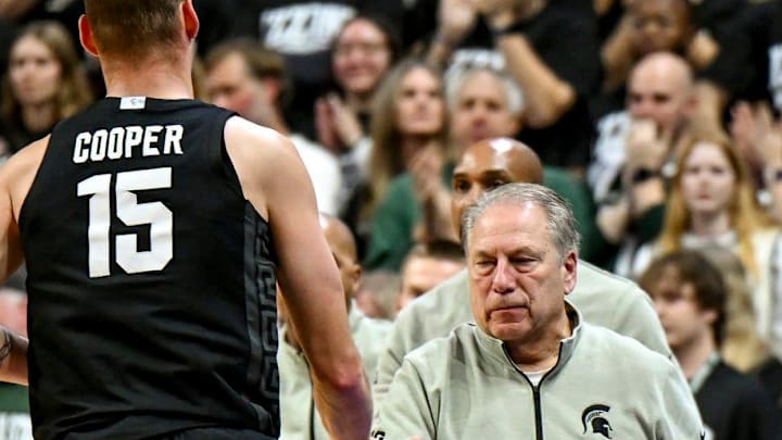 Michigan State's head coach Tom Izzo, right, slaps hands with Carson Cooper during the first half in the game against USC on Monday, Jan. 5, 2026, at the Breslin Center in East Lansing.