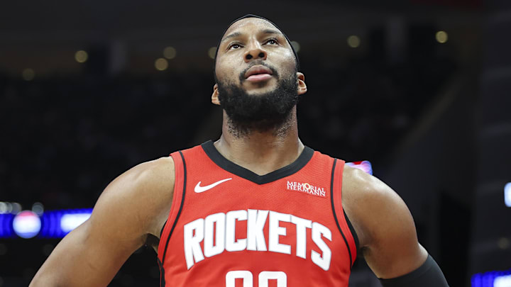 Apr 12, 2026; Houston, Texas, USA; Houston Rockets guard Josh Okogie (20) reacts after a play during the second quarter against the Memphis Grizzlies at Toyota Center. Mandatory Credit: Troy Taormina-Imagn Images