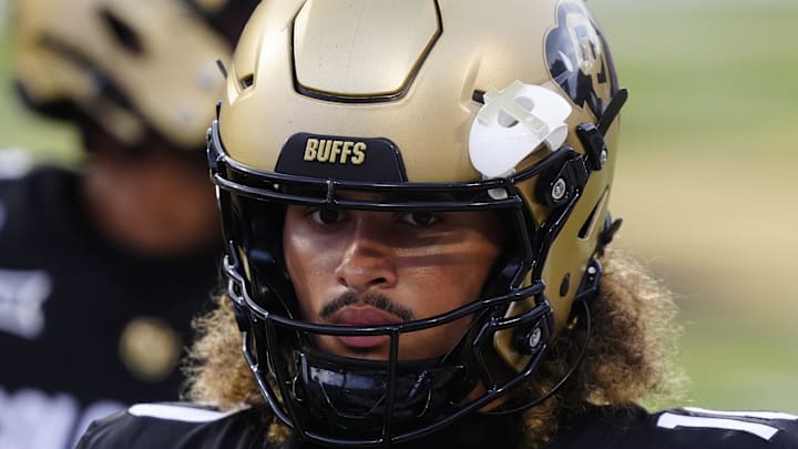 Aug 29, 2025; Boulder, Colorado, USA; Colorado Buffaloes quarterback Julian Lewis (10) warms up in the second quarter against the Georgia Tech Yellow Jackets at Folsom Field. 