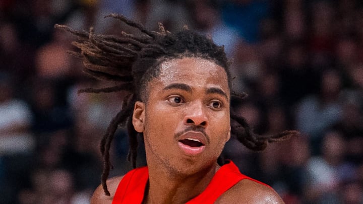 Toronto Raptors forward Collin Murray-Boyles handles the ball against the Denver Nuggets. Toronto Raptors forward Collin Murray-Boyles handles the ball against the Denver Nuggets.