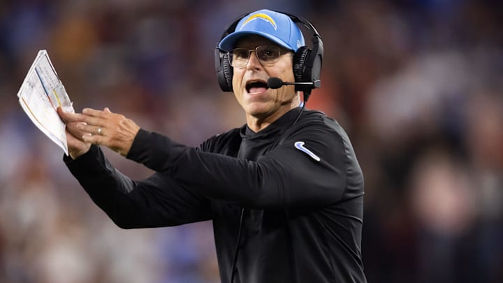Oct 21, 2024; Glendale, Arizona, USA; Los Angeles Chargers head coach Jim Harbaugh reacts against the Arizona Cardinals at State Farm Stadium. Mandatory Credit: Mark J. Rebilas-Imagn Images
